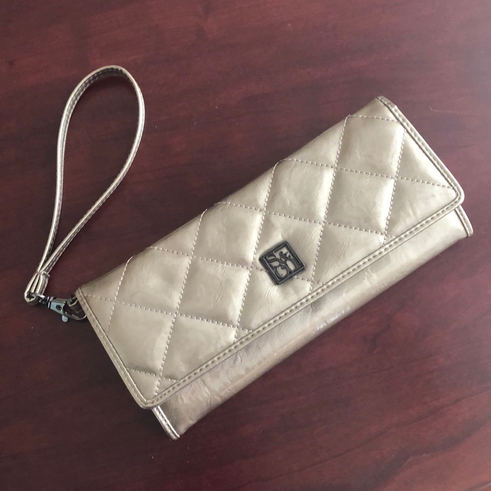 Gold wristlet brand new